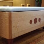 Reproduction Niagara blanket chest made with Quilted Maple. Insets and legs are Bubinga, a Brazilian Rosewood.