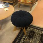 Newly reupholstered in Growpoint Navy Blue. Base redone in Wheat. Sculptura Pouffe