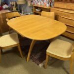 M786 Double Ped table, three M552 side chairs and M549 Captains chair in original Excellent Wheat. Has two leaves. One 552 shows some usage, the others minimal use. Seats do need reupholstering. $1600